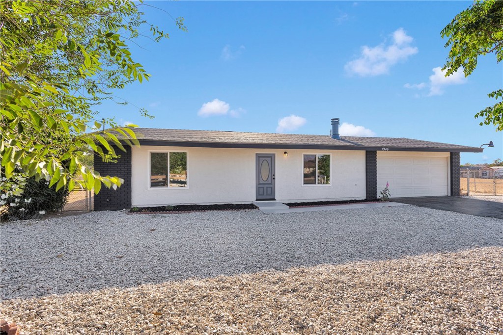 NEW LISTIING! FHA/VA Eligible! Check out this gorgeous home in Hesperia on a flat lot with room for RV, boat, pool or add a ADU or detached garage ... This beautiful, rehabbed home has 3-bedroom, 2 bathrooms to include a NEW ROOF, NEW DUCTING & NEW WINDOW THROUGHOUT, plus central air & heat. This home will not disappoint even the pickiest buyers with an oversized master bedroom and bonus room off the kitchen for large family gatherings. Walk into a sitting area with a brick fireplace, and open family room with new kitchen cabinets with light quartz countertops, new stainless-steel appliances, and a nice sized farm sink. All new windows include new shutters. Walk out the sliding glass door off the family room to the back covered patio. All new flooring, baseboards, new lighting, makes it easy for the new buyer to walk in, set up and enjoy! Tehe master bedroom has 2 closets and walk-in shower and double sinks. The front yard was landscaped with rock, shade trees, mature flowering bushes and the backyard is a blank canvas with wide open space.