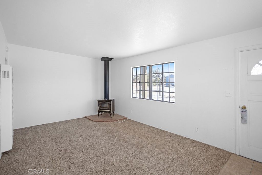 Photo of 7070 Grand Ave, Yucca Valley, CA 92284 (MLS # JT26056129)