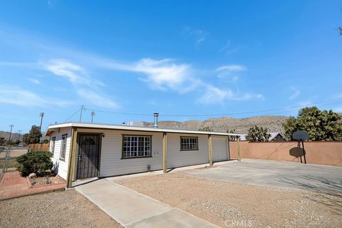 Photo of 7070 Grand Ave, Yucca Valley, CA 92284 (MLS # JT26056129)