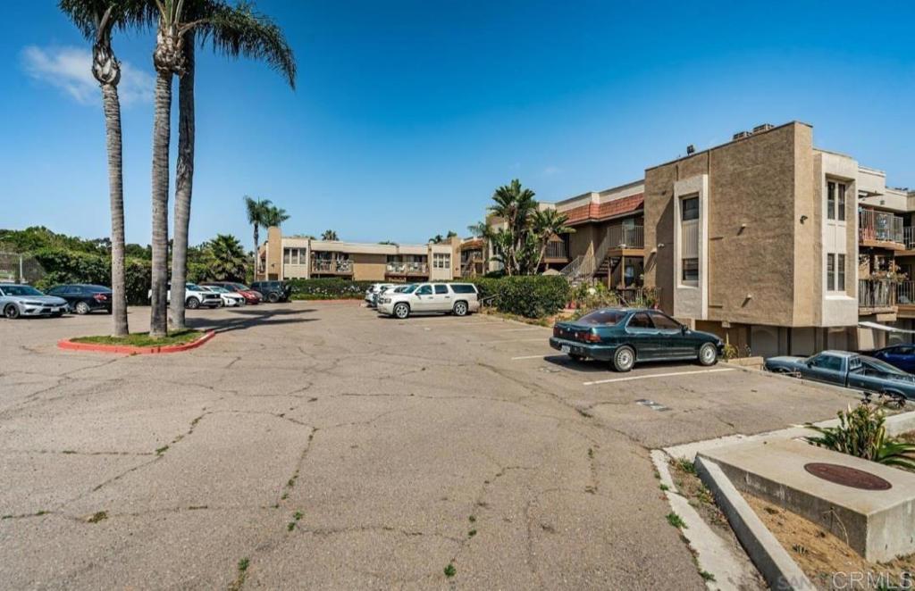 Freshly priced and ready for its new owner. This well-kept home sits in a prime National City location, just steps from Las Palmas Park. An entrance from parking lot takes you straight to the park that offers a public pool, little league baseball fields, dog park, tennis courts, and a recreation center - perfect for active lifestyles and family fun. Love to Golf? You'll also be close to a scenic nine-hole course for a quick round any day of the week. This updated 2 bed/2 bath home offers the lower level corner unit with a fenced patio and another space at the front door to make it your own private little sitting nook. Just minutes to freeway entrances, with shopping, dining, and everyday conveniences close by.