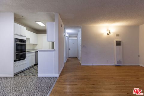 Photo of 11133 ROSE Avenue #21, Los Angeles, CA 90034 (MLS # 25479693)