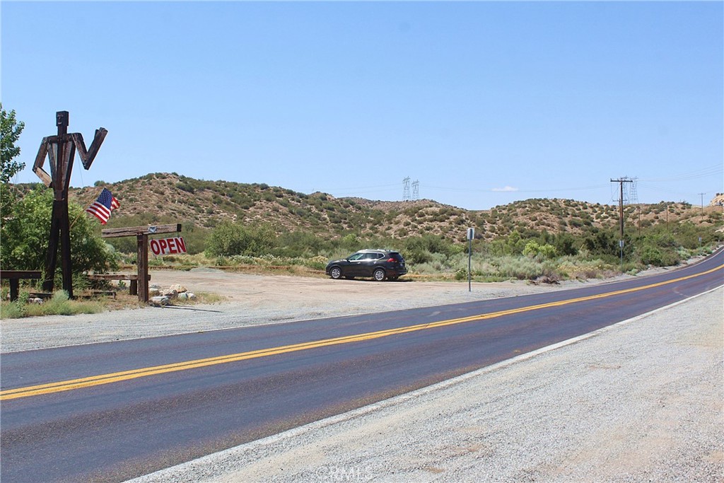 This expansive property offer significant potential for developers and investors. The land spans approximately 62.69 acres of land with about 655 feet fronting, paved Summit Valley Rd just about 4000 feet north of Highway 138 providing ample access, visibility and natural beauty of the desert, mountains and valley vistas. Property is next to Ponderosa Nursery. It's a prime location for those looking to invest in land with future growth potential in the rapidly developing San Bernardino County. Easy access to the I-15 via Highway 138 that has been recently improved, also minutes to the mountains Crestline and beyond all the way to Big Bear, easy to travel north to Las Vegas or south to Rancho Cucamonga, Ontario, Fontana, San Bernardino and all the cities down bellow and short driving distance to SCLA - Southern California Logistics Airport. The High Desert is now the future home of the recently approved High Speed Train from Apple Valley to Las Vegas and to the south to Rancho Cucamonga. The project is expected to break ground in the Victor Valley soon and be completed in over the course of the next few years, this projected is expected to bring in jobs and boost the economy of the High Desert.
