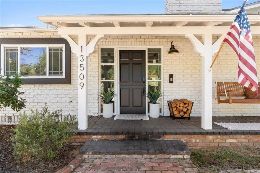 Completely remodeled in 2022, this 3 bedroom, 2 bath home with an attached 2-car garage, separate laundry room, and RV parking has it all. A new roof installed (April 2023), Solar Panels, and an EV Charger.   Step through the charming Dutch door into an open great room featuring beautifully refinished exposed beam ceilings and durable luxury vinyl plank flooring throughout. The newly renovated kitchen has a large island, quartz countertops with subway tiled backsplash, stainless steel appliances, upgraded fixtures, and even a wine fridge!  Both bathrooms have been tastefully updated with new cabinets, countertops, tile/stone finishes, fixtures, and glass enclosures. You’ll also enjoy new lighting and ceiling fans throughout, plus updated mechanicals including a 2022 A/C, furnace, and water heater. Garage has been finished with new flooring.  Set on a .34-acre usable lot, the property offers a large play area with low-maintenance artificial turf—perfect for family fun or entertaining.