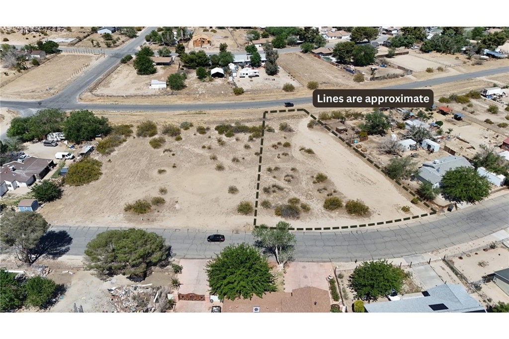 Lot 108 on Ridgemist St/175th St E on the other, (APN: 3072-015-026) GPS: 34.611832, -117.817236 This residential lot is located in Lake Los Angeles area in Los Angeles County. This lot has been zoned as Residential Agriculture (R-A). This R-A (Residential-Agricultural) zoning in Los Angeles County allows for single-family homes and certain agricultural uses, making it ideal for properties with a rural or semi-rural character. This zoning permits keeping livestock and growing crops, subject to specific regulations, while maintaining a residential focus. It provides flexibility for those looking to combine residential living with small-scale farming or animal husbandry. Utilities are provided in the street. The lot is provided water by the LA County Water District, WWD-40-38. Electricity is in the street. Residents in the area have private septic tanks for their sewer needs. This property does not yet have an address. While the boundary lines on the map offer a glimpse, they are only approximate. A Buyer should verify boundaries, zoning and utilities, ensuring every aspect aligns with their vision for the property. Adjacent lot is also for sale.