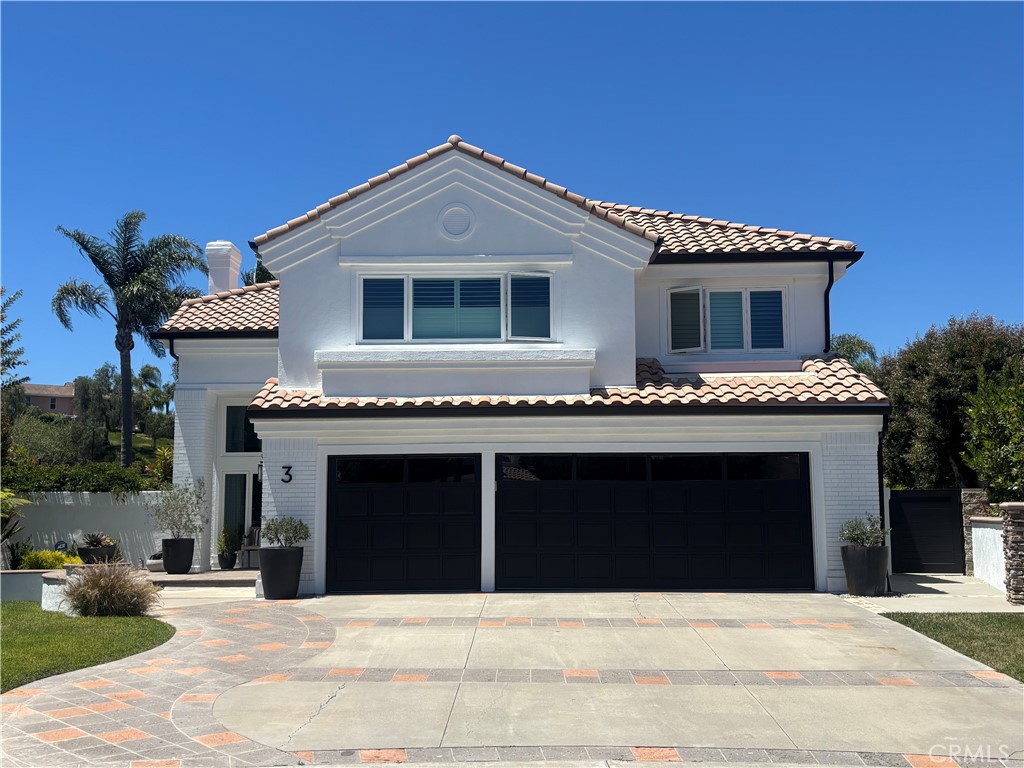 Experience the largest floor plan in San Marin - a highly sought after Laguna Niguel location - set on a spacious, pie-shaped lot with open views! Nestled on a cul-de-sac, this beautifully remodeled home offers ultimate privacy with wide side yards and thoughtfully updated finishes. The layout includes 5 generously sized bedrooms and 3 full baths, with a main-floor bedroom (currently used as an office) and full bath. The expansive living and dining rooms flow seamlessly into the kitchen with a large island opening to the spacious family room, ideal for entertaining - all with fresh paint, new windows / doors and cathedral ceilings that make the home light and bright. Upstairs you’ll find 3 additional bedrooms and 2 baths, including the primary suite, and a large bonus room (could be a 5th bedroom). Step outside to your private entertainer’s backyard featuring a sparkling pool and spa, built-in BBQ, and a turfed sports court - or room enough for an ADU. Enjoy a beautiful, private setting with peek-a-boo ocean views ideally located just minutes from renowned beaches, scenic trails, top resorts, and award-winning schools. *Professional photos coming soon.