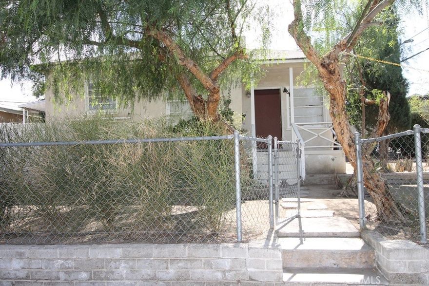 Perfectly nestled just one block from Barstow High School. This corner lot home has a charming appeal.  The spacious living areas are adorned with original details, creating a cozy ambiance. Imagine sipping your morning coffee in the delightful dining room or outdoors in the private garden area out back.  An indoor laundry room, offering practicality without sacrificing style, making chores a breeze. With a little paint, and a few easy upgrades you can have a home that honors its roots while providing the modern amenities you crave.  Outside discover your own private oasis. The serene backyard, framed by towering mature trees, is a sanctuary for relaxation and rejuvenation. With its prime location just steps away from Barstow High School, this home is ideal for seeking a blend of convenience and charm. Don’t miss the opportunity to make this treasure your own—where every corner tells a story.