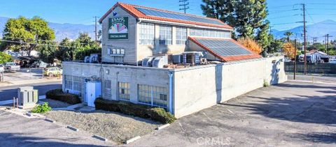 Photo of 408 S Stoddard Ave, San Bernardino, CA 92401 (MLS # IV25277864)