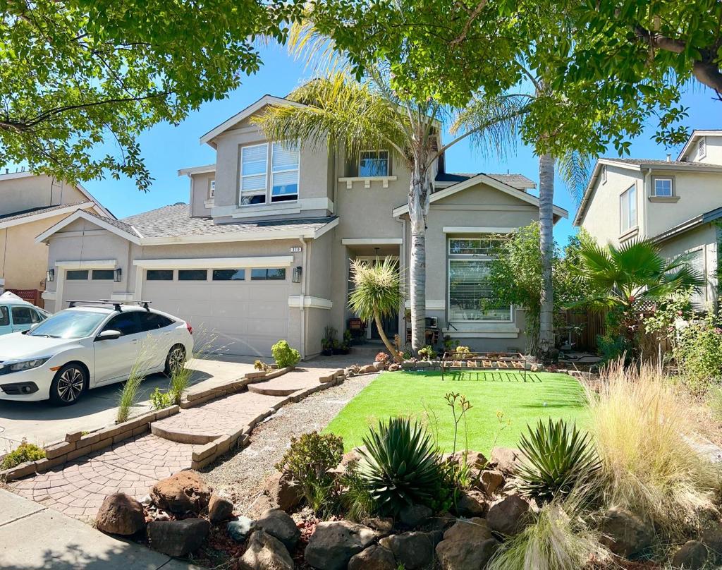 Welcome to this spacious 4-bedroom, 3.5 bathroom home in the charming city of Gilroy. With 2,671 square feet of living space, this home offers ample room for your family. The kitchen is an ideal space for you coffee bar, preparing meals and entertaining guests. Includes a generous walk-in pantry and utility desk. Enjoy formal gatherings in the front living room or cozy up in the family room. Guests will enjoy the first floor bedroom suite with backyard patio access. Just a little TLC needed. The lot size of 6,434 square feet, providing plenty of space for outdoor activities and includes a spacious gym/yoga/art studio. The 3 car garage includes a utility sink for all your creative projects. Conveniently located near parks, Christopher High School, shopping, freeway and downtown events. This one is a Must See!