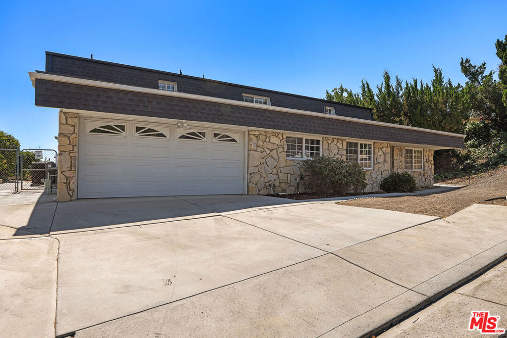MOTIVATED TO LEASE: WE ARE OFFERING 50% OFF YOUR FIRST MONTH'S RENT (with an approved application)! Your backyard paradise awaits: a large sparkling pool, sweeping hillside views, and an oversized pergola perfect for al fresco dining. Inside this prime Woodland Hills home offers almost 4k square feet of living space with 5 spacious bedrooms and 5 baths. Newly replaced roof, new carpets, and an updated space with fresh paint, this home is live-in ready and available right now.
