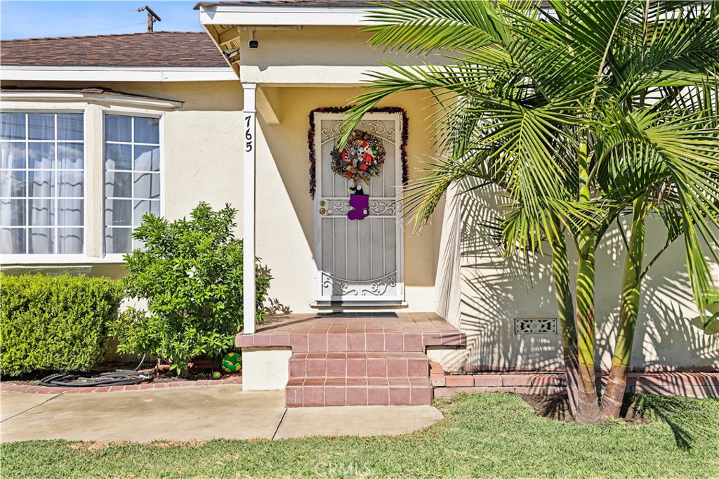 Welcome to this beautifully maintained 3-bedroom, 2-bath home nestled on a spacious corner lot in a prime location. The home features a wrought iron gate for additional privacy and security. Offering comfortable living space, this property blends classic charm with thoughtful upgrades — perfect for anyone seeking a move-in-ready home.
Step inside to an updated kitchen complete with an electrical upgrade. Enjoy peace of mind with copper plumbing throughout, an upgraded electrical meter, and a remodeled bathroom and laundry room that bring a fresh and stylish touch to everyday living.
Outdoors, the home is equipped with a sprinkler and drip irrigation system that supports a lush variety of fruit trees including citrus, guava, and avocado — your own private orchard! The spacious corner lot also provides plenty of room for gardening, entertaining, or future possibilities.
Located just minutes from parks, schools, major freeways, and hospitals, this home offers convenience and accessibility for every lifestyle.
