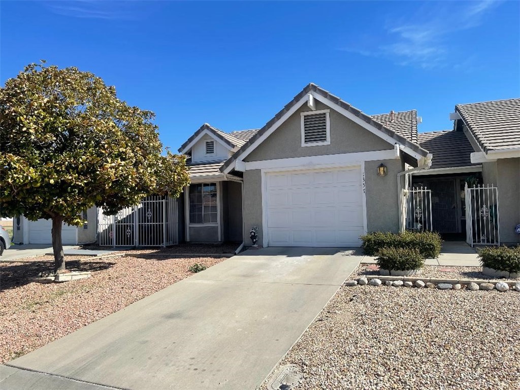 Great opportunity to own this beautiful comfortable condo. It's located in a great neighborhood of American Village, a 55 + community. This property offers 2 bedrooms, 2 bathrooms, tile and carpet flooring, a sliding glass door that opens to the private patio, fireplace and A single car attached garage, The one-car garage offers attic storage with pull down ladder access. The master bedroom is spacious with a large closet. The secondary bedroom contains a large closet. This property is conveniently located close to club house, shopping centers, the post office, banks and pharmacy stores.