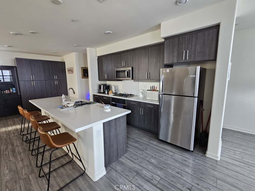 Here's an enhanced version of your description:
---
This stunning three-story home features a spacious two-bay garage and an inviting open-concept living and dining area located on the second floor, complete with a large patio perfect for outdoor relaxation. The top level is home to three well-appointed bedrooms, including a luxurious owner’s suite that offers ultimate comfort and privacy. Solar panels are installed, providing energy efficiency and sustainability.
Nestled within The Preserve masterplan in Chino, CA, this home grants access to an array of exceptional community amenities, including parks, a tennis court, a swimming pool, scenic nature trails, and more. Conveniently located near shopping centers and major freeways, with Cal Aero Preserve Academy just a short walk away, offering added convenience for families.