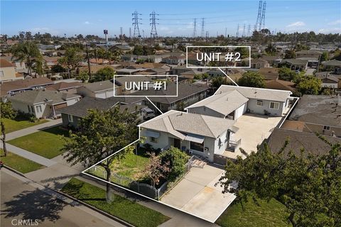 Photo of 8728 Flower St, Bellflower, CA 90706 (MLS # SW26064429)