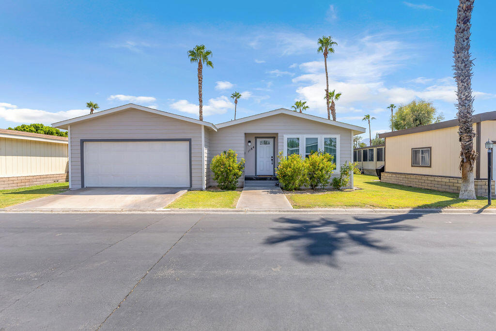 Step into this beautifully remodeled 2 bedroom, 2 bath home with a versatile bonus room featuring its own mini split A/C, perfect for an office, hobby room, or guest space. Everything is fresh and ready for you, including a new roof on the home and garage, new flooring, lighting, showers, countertops, closets, water heater, windows, and appliances such as refrigerator, microwave, and stove. You will appreciate the dedicated laundry room and the fresh interior and exterior paint that gives the home a bright, modern feel. Desert Sands offers a welcoming and active 55+ lifestyle with amenities to enjoy and neighbors who quickly become friends. This home is truly move in ready, just bring your suitcase and start your next chapter.