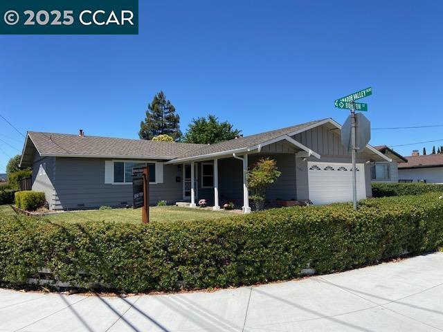 **Prime Corner Lot Location!** This move-in-ready home is perfect for a new family, featuring a spacious 3-bedroom, 2-bathroom floor plan with approximately 1288 sq ft on a 6611 sq ft lot. The interior and exterior have been freshly painted. The living room includes a fireplace, and there's a dining room, a family room, and a dining nook. A sliding dual-pane glass door opens to a serene yard with a new pergola and terracotta-painted decking. The home boasts hard-surface flooring throughout, dual-pane windows, and updated baths. The galley-style kitchen is equipped with granite counters, a stainless steel refrigerator and dishwasher, a disposal, an electric cooktop, a built-in oven, and a water softener and purifying system. You'll also find a newer washer and dryer in the garage, along with central air conditioning and heating. For outdoor entertaining, there's a spotlight in the backyard and sensor lights at the garage driveway. The property is conveniently located near shopping, theaters, restaurants, and top-rated K-12 schools. It offers easy access to I-680 and I-580, and is close to the BART station.