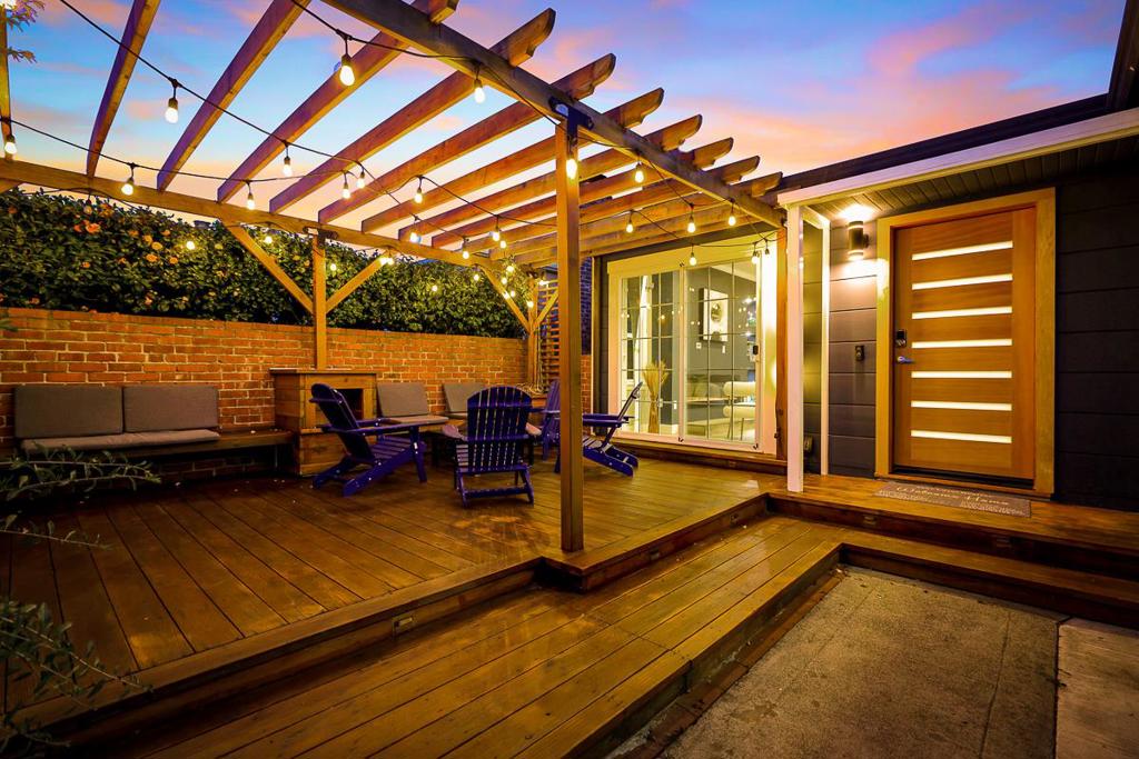 Welcome to 114 Garden Lane, a place you may called Forever Home. Nestled in Daly City's highly sought-after Broadmoor Garden Village, this 2-story single SFH with no HOA is perfect for multigenerational living or house hacking. A charming enclosed front yard with a well-crafted patio and solar lighting warmly welcomes you. The ground floor features a formal living room with a cozy fireplace, a formal dining room seamlessly connected to a fully remodeled kitchen, and two spacious bedrooms that share a newly updated bathroom. Lower floor with separate entrance: 1 bed/1 bath, wet-bar with eat-in area, and spacious living room. Perfect as an in-law unit or for additional rental income. Low-maintenance backyard, 1-car garage, and nestled in a premium neighborhood within walking distance to top-rated elementary schools. A perfect blend of convenience and quality! EV Charger is installed!
