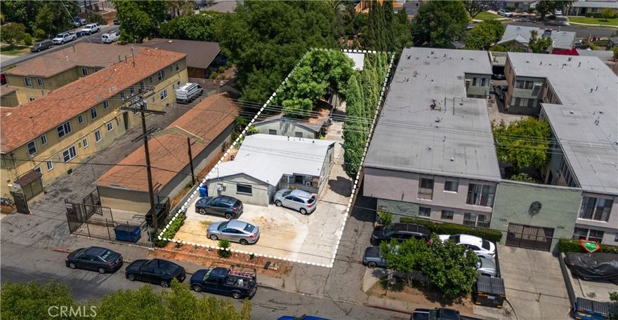 Rare LAR3 zoned development or value-add income opportunity in a prime pocket of Van Nuys. This property features four 2-bedroom, 1-bathroom cottage-style units, with three of the buildings detached, each offering private entry and attached 1-car garage and situated on an oversized 10,104 sq ft lot measuring approximately 50 feet wide by 202 feet deep. The rear unit enjoys a large private backyard and will be DELIVERED VACANT, ideal for owner-users or premium tenants. All units are currently occupied on month-to-month leases with consistent paying tenants, generating $6,400 per month with market rents supporting potential income of $9,500 per month and representing nearly 48% upside for investors seeking immediate value-add potential. Separate gas and electric meters add flexibility for long-term investors, developers, or owner-users. The highly desirable LAR3 zoning provides multiple exit strategies, including redevelopment, small lot subdivision, or ADU expansion potential (buyer to verify). Conveniently located south of Victory Blvd and east of Van Nuys Blvd, with close proximity to freeways, schools, retail, and major employment hubs.