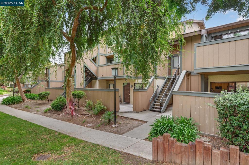 Discover your new home nestled in the vibrant Warm Springs district of Fremont. This newly updated 1 bedroom, 1 bathroom condo features a contemporary open layout with fresh paint, sleek new flooring throughout, and an upgraded kitchen equipped with stainless steel appliances and new countertops, ideal for both relaxing and entertaining. The bath has been thoughtfully reimagined with modern fixtures and tilework for a clean feel. A sliding door that leads to a private patio, offering a tranquil retreat with park like views. With in unit laundry hookups, assigned parking, and a well maintained association in a location close to transit, shopping, and dining, this condo offers the perfect blend of comfort, convenience, and style.
