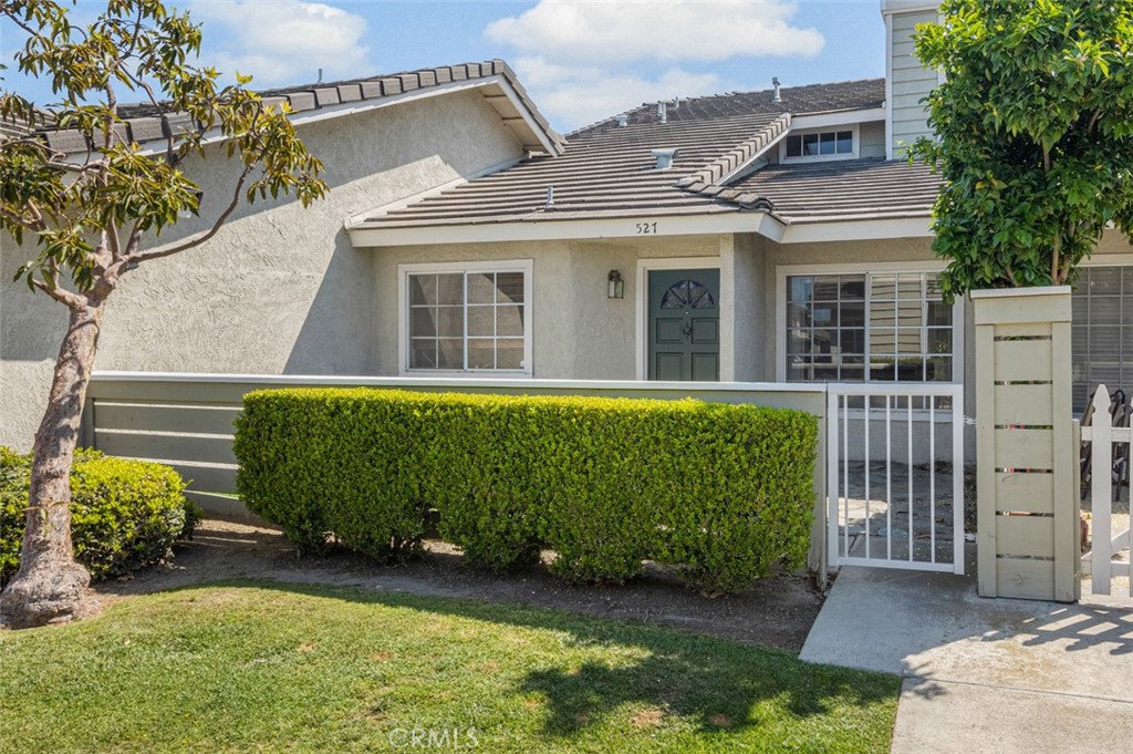 Exceptional price for a great home in a great community! A second shower and vanity can be added upstairs. Seller is offering a $5,000 credit to the buyer for closing costs!! 527 Dartmouth delivers all of the must have options you are looking for: A two story unit with nobody above or below, a fantastic outdoor private patio and attached 2 Car Garage with direct access! Stanford Court is a very desirable, quiet and beautifully maintained community. Upon entry you are greeted by towering vaulted ceilings, new carpet, paint, scraped ceilings and an open concept floor plan. Natural daylight floods into this home through large windows overlooking the front patio. The home features a newer water heater, newer furnace and newer AC. Your kitchen, open to the family room, showcases white cabinetry, a gas range and breakfast bar seating! A gas burning fireplace warms the family room and casual dining area. Your half bath downstairs accommodates your guests. The deluxe primary bedroom upstairs has vaulted ceilings, walk-in closet, a nook perfect for a home office space and personal primary bathroom. Also upstairs you will find second spacious guest bedroom with mirrored closet doors. Your 2 car garage with direct access also hosts your inside laundry. Stanford Court association offers a resort style pool, jacuzzi and greenbelt space.