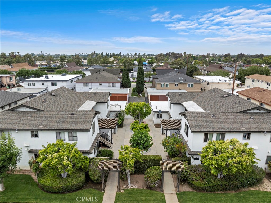 We are proud to present 1010–1016 Valencia Street, a rare side-by-side offering of two 4-unit apartment buildings with separate APNs, located in the heart of Costa Mesa—one of Southern California’s most desirable coastal housing markets. This turnkey multifamily investment consists of eight fully rented 3-bedroom, 2-bathroom units, offering a strong blend of immediate income and long-term upside. The property sits on a 13,068 square foot lot and includes 9,340 square feet of building space. A lushly landscaped central courtyard creates a welcoming and private environment for residents, while recent renovations to both the interior and exterior enhance the overall appeal. The units feature modern updates such as vinyl plank flooring, stainless steel appliances, updated cabinetry and countertops, and open-concept kitchens. Recent improvements include new staircases and sewer line. The property provides ample parking with eight single-car garages and six uncovered spaces, along with on-site laundry for added tenant convenience. Most of the units are currently leased close to market rents, reflecting the high quality of the renovations and the desirability of the location. The owner is open to selling the buildings separately or as a package, offering flexibility to investors looking for stable, high-performing assets in a supply-constrained coastal market. This is an excellent opportunity to acquire a well-maintained, income-generating property in a prime Costa Mesa location.