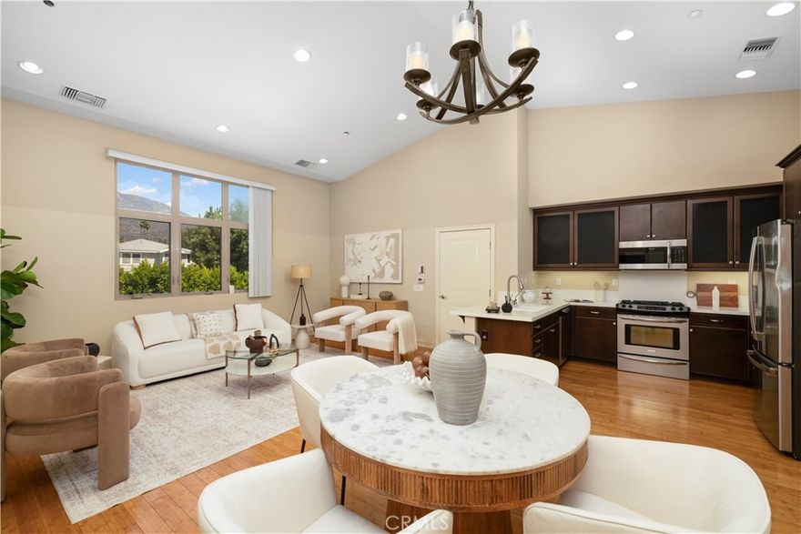 Welcome to 1406 S. California Ave. Unit C, a beautifully maintained 2-bedroom, 3-bathroom townhome-style condo located in a desirable gated community in Monrovia. Originally built in 2009 by the highly regarded Mursol Construction. Offering approximately 1,520 square feet of living space, this home combines modern design, functionality, and comfort.

The inviting open-concept floor plan features a spacious living and dining area with soaring vaulted ceilings and abundant natural light, perfect for both entertaining and everyday living. The modern kitchen is equipped with sleek quartz countertops, stainless steel appliances, ample cabinetry, and a breakfast bar that seamlessly connects the space.

Upstairs, the primary suite is a true retreat, complete with a walk-in closet, dual vanity bath, and a private balcony for relaxing mornings or evenings. A second generously sized bedroom is located on the lower level, offering privacy for guests, family, or a home office setup.

Additional highlights include a two-car attached garage, in-unit laundry, central HVAC, and thoughtful storage throughout. The gated community provides added peace of mind as well as BBQ and outdoor entertaining areas, plus guest parking for convenience.

Ideally situated in the heart of Monrovia, this home offers close proximity to local shops, restaurants, hiking trails, and the charming Monrovia Historic Old Town district. With excellent nearby schools and easy access to major freeways, this is an exceptional opportunity to own a move-in ready home in a vibrant and growing community.

Don’t miss the chance to make this modern Monrovia gem your new home!