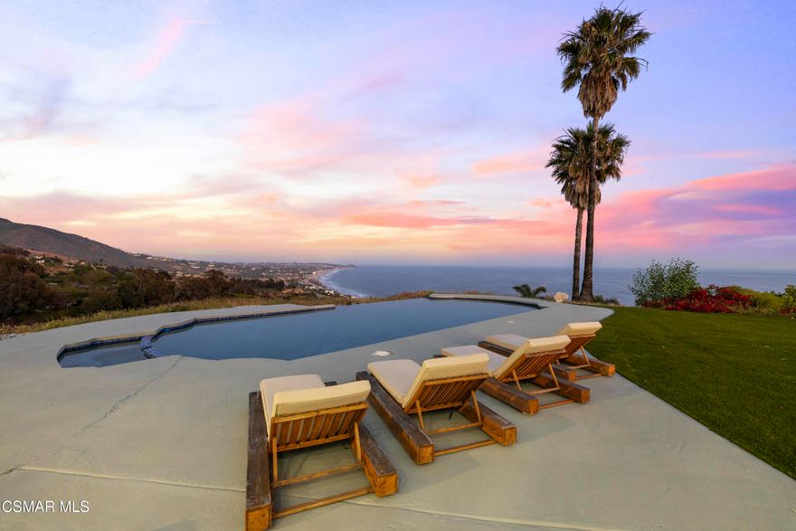 Welcome to your own private Malibu resort--an extraordinary five-bedroom, six-bathroom estate perched above Pacific Coast Highway with beautiful panoramic views of the best beaches in Malibu, and the surrounding mountains. Set on an expansive 4-acre compound, this breathtaking property embodies the essence of coastal California luxury, combining privacy, elegance, and endless potential in one of Malibu's most coveted locations. From the moment you enter, you're greeted by sweeping ocean vistas that pour through oversized windows, filling the home with natural light and a constant reminder of the stunning beauty that surrounds you. Whether you're lounging in the living room, preparing meals in the gourmet kitchen, or waking up in the primary suite, the Pacific Ocean is your daily backdrop. Outside, the resort-like grounds offer everything you could imagine for both relaxation and recreation. The pool and spa area boast some of the best views in Malibu--perfect for entertaining or enjoying a peaceful sunset. A private tennis court adds to the estate's allure, while manicured lawns and lush landscaping create a serene, secluded ambiance.Nearby world-class hiking trails invite you to explore Malibu's natural beauty, offering endless adventure just minutes from your front door. Adding even more value and versatility, the sale includes additional adjacent parcels that provide room to expand, build a guest house, or develop your dream amenities--offering a rare opportunity to own a true legacy property. This is more than a home--it's a lifestyle. A peaceful sanctuary just minutes from the heart of Malibu, world-class surfing, hiking trails, restaurants, and top-tier schools. Whether you're seeking a luxurious full-time residence, a family compound, or an elite vacation retreat, this estate delivers on every level. A once-in-a-lifetime offering in prime Malibu. Paradise found.