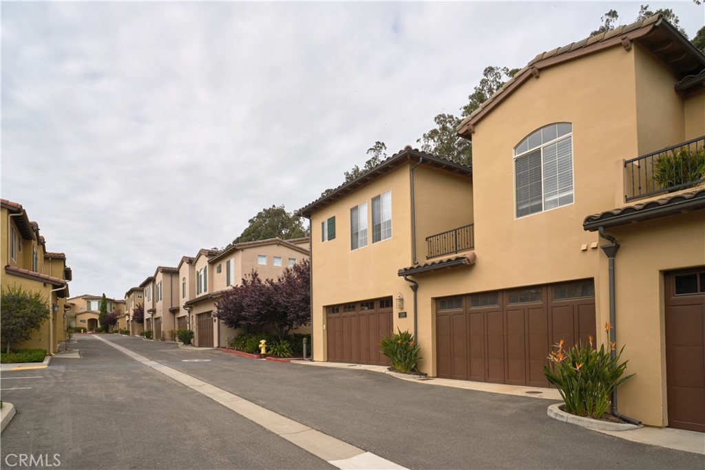 Welcome to 1191 Swallowtail Way located in the desirable Monarch Dunes Townhomes of Trilogy. This residence features 3 bedrooms, 2.5 bathrooms, and 1,735 square feet of thoughtfully designed space with resort-style living. This charming home has a private gated courtyard entrance that leads you an open floor plan where you can entertain your guests in a modern styled kitchen that includes stainless steel appliances, pantry area, breakfast bar that looks out to the living and dining area. There is also a separate laundry room located down stairs with washer and dryer included. All 3 spacious bedrooms are located upstairs and have large windows that overlook the beautiful scenery. There is also private balcony in the primary bedroom. Inside, the main level boasts high ceilings and an open layout that suits modern lifestyles. The bright living room with fireplace flows seamlessly into the dining area and the well-appointed kitchen. A chef’s delight, the kitchen is equipped with stainless steel appliances, a gas range, shaker-style cabinetry, granite counters, a walk-in pantry, and a bar-height breakfast counter. This level also includes a convenient laundry room, a half bathroom, under-stair storage for organization, and direct access to the attached two-car garage. Upstairs, two guest bedrooms enjoy serene views, while a floor-to-ceiling linen closet and a full bathroom add to the functionality of this floor. The primary suite serves as a tranquil retreat with a walk-in closet, a private balcony perfect for morning coffee or evening stargazing, and an en-suite bath featuring dual sinks, extended countertop, toilet closet and tiled shower. Located directly across from the serene Monarch Butterfly Habitat, this home provides a picturesque setting. As part of the Trilogy community, you’ll enjoy an array of exceptional amenities, including a pool, spa, clubhouse, gym, and so much more! Discover the perfect combination of elegance, convenience, and community at 1191 Swallowtail Way. Schedule your private tour today!