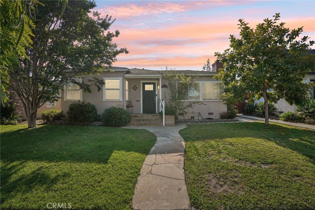 Welcome to the heart of California Heights — a neighborhood celebrated for its tree-lined streets, architectural charm, and strong sense of community. This beautifully maintained 1939 home offers 3 bedrooms, 1 bathroom, and approximately 1,226 square feet of comfortable living space on a generous ~5,700 square foot lot.
Inside, timeless details like hardwood floors, abundant natural light, and a thoughtful single-level layout create an inviting and functional home. At its heart is the showpiece kitchen — a perfect blend of style and practicality, featuring quality finishes, generous cabinetry, and space to cook, gather, and entertain with ease. The kitchen flows seamlessly into the dining and living areas, making it the true hub of daily life.
Three well-sized bedrooms provide flexibility for family, guests, or a dedicated home office. The updated bathroom adds modern comfort while maintaining the home’s warm character.
Step outside into a private backyard where vibrant plumeria blooms perfume the air — a serene retreat ideal for summer barbecues, weekend gardening, or simply relaxing in your own green escape. The detached garage and driveway offer ample parking and storage.
With a Walk Score® of approximately 62, you’ll be just moments from local coffee shops, dining, parks, and schools. It’s the perfect blend of neighborhood charm and everyday convenience, in one of Long Beach’s most beloved districts.