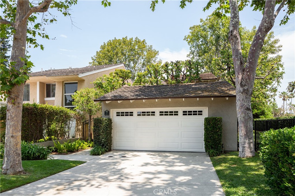 Tucked away at the end of a cul-de-sac, this beautifully upgraded 3-bedroom, 2.5-bath home offers a completely private setting. Thoughtful enhancements include professionally landscaped outdoor spaces, wide plank flooring, double-paned noise-reducing windows, and soft cream carpeting in the bedrooms. Both bathrooms feature subway-tiled showers, with a skylight brightening the primary bath. The kitchen is outfitted with granite countertops, a 5-burner gas range, and a KitchenAid oven/microwave, all overlooking a serene outdoor entertaining area. Additional comforts include central air conditioning and multiple outdoor spaces off the living and dining rooms, plus a rare enclosed grassy side yard. A 2-car garage with EV charging and a long private driveway add to the convenience. Weekly gardening is included. Ideally located near the community pool, local shops, parks, award-winning schools, and scenic Back Bay trails. No pets, please.