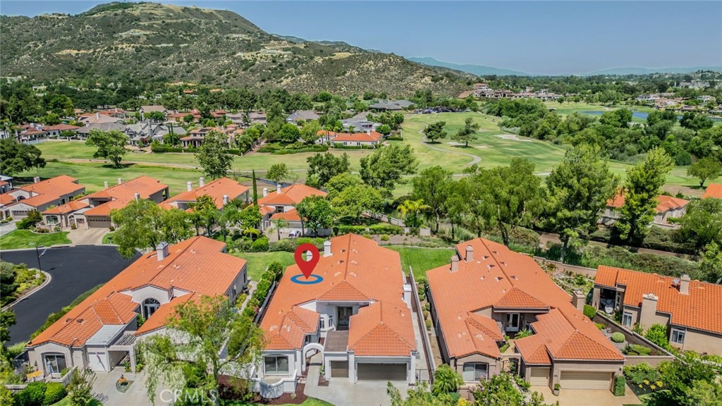 LUXURY LIVING awaits! Welcome to refined elegance in one of Murrieta's most sought after guard gated communities - BEAR CREEK. This immaculate luxury single story home offers a seamless blend of modern design, upscale finishes, and serene views. Perfect for those who crave comfort, style and resort like living! Step inside to discover a newly REMODELED bright and inviting living space surrounded by expansive windows bathing you in natural light and providing stunning views. The gourmet kitchen is a chefs' dream, featuring new stainless steel appliances, custom backsplash, quartz countertops, and spacious center island with waterfall edging, sure to impress and ideal for entertaining. Your living space includes a separate living room and family room both with their own fireplaces. The family room also features a step down bar and is situated to enjoy the surrounding picturesque views just outside along with your adjoining dining room. Your primary suite is a tranquil retreat with a spa-inspired ensuite bathroom featuring large walk in custom tiled shower, soaking tub and double sided fireplace. Additional bedrooms offer generous space for guests or a home office. Bonus- EVERY bedroom features their own ensuite bathroom as well as a 4th hallway bathroom for added convenience- and all have been renovated. Additional upgrades to the home include new flooring throughout, new paint inside and out, new fixtures and lighting, and more. Enjoy exclusive access to community amenities including Jack Nicklaus Signature Golf Course, resort style pool, tennis courts, gym(s), and clubhouse- all just steps from your front door. Whether you're relaxing on your peaceful patio with a glass or wine or teeing off just minutes away this home offers a lifestyle of effortless luxury. Live where everyday feels like a vacation and schedule your private showing today!