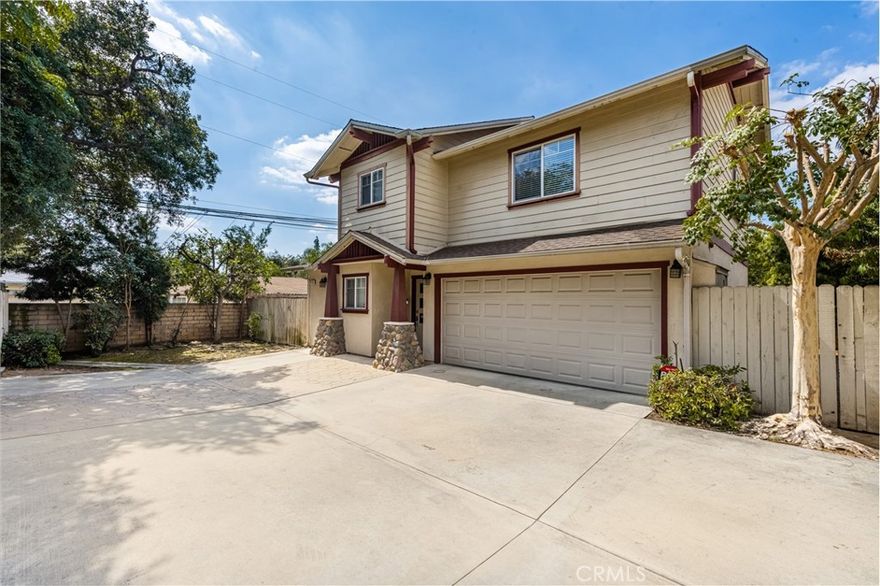 Just steps from the vibrant charm of Old Town Monrovia, this beautifully maintained 3-bedroom, 2.5-bath home combines modern comfort with the character of a thriving foothill community. The light-filled living room features soaring ceilings, a cozy fireplace, and direct access to a private patio perfect for outdoor gatherings. A spacious dining area flows seamlessly into the well-appointed kitchen with abundant cabinetry and counter space. Upstairs, the primary suite offers vaulted ceilings, double closets, and an en-suite bath, while two additional bedrooms provide versatility for family, guests, or a home office. Additional highlights include inside laundry, central heating and air, and a two-car attached garage with direct access. The home is at the end of a shared driveway, providing lots of room for extra parking. Nestled in one of the San Gabriel Valley’s most desirable towns, residents enjoy Monrovia’s tree-lined streets, breathtaking mountain backdrop, and lively Old Town filled with dining, shops, and a weekly street fair.