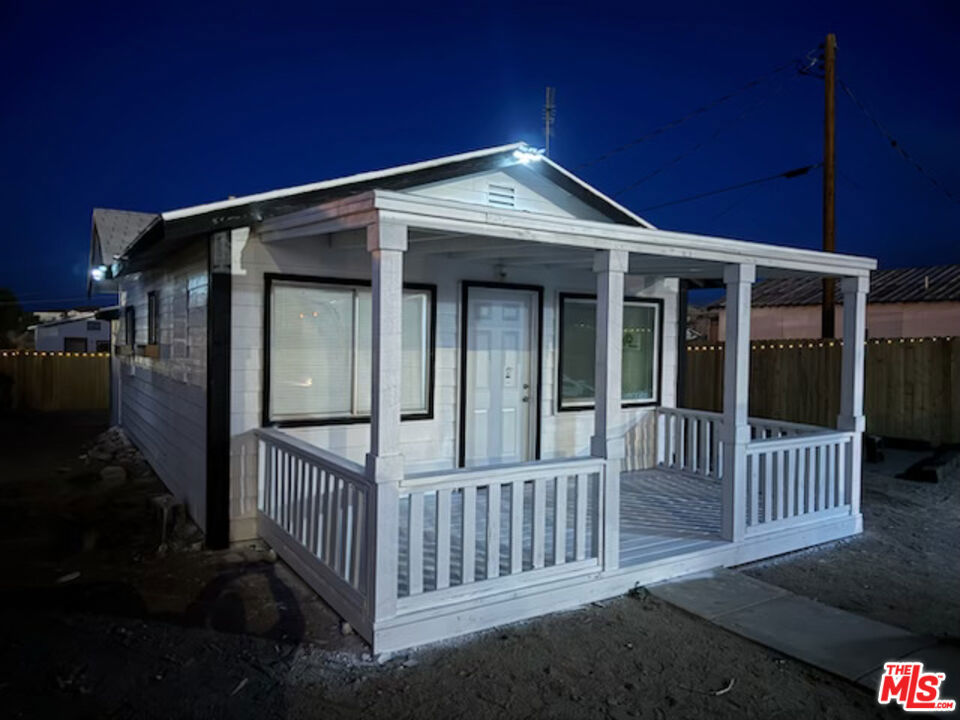 The property at 441 F St, Needles, CA 92363 is a single family home with characteristics that exhibit classic elements of a bungalow or cottage. Home features brand new paint / texture , flooring, and a new roof. It is located in the Mojave Desert region, near the Colorado River. If you are looking to invest in a high-demand tourist area, vacation properties can be very profitable. The Colorado River is a popular destination for outdoor activities like: White-water rafting and kayaking, fishing, boating, camping, and hiking along its banks and in nearby national parks. These properties are typically rented out on a short-term basis and can have significant seasonal income potential. The area is known for its desert landscape, warm weather, and proximity to the California-Arizona border. A one-story, home with 2 bedrooms and 1 bathroom, set on a 6,250 sq ft lot. This property offers a lot of potential for a long-term investment in the desert region especially with a renovation or conversion to a rental. The property provides scenic mountain views, has a simple yard with laminate floors, a living room and dining area. The home enjoys views characteristic of the high-desert region rocky ridges and jagged peaks in the distance. It is a great a fixer-upper Potential for positive cash flow . Whether it's a rental property or a fix-and-flip, it could also be an equity-building project. Laughlin and lake Havasu is less then 40 min drive. Las Vegas is less then 2 hour drive. Great opportunity to own your own home. This property offers sellers financing.