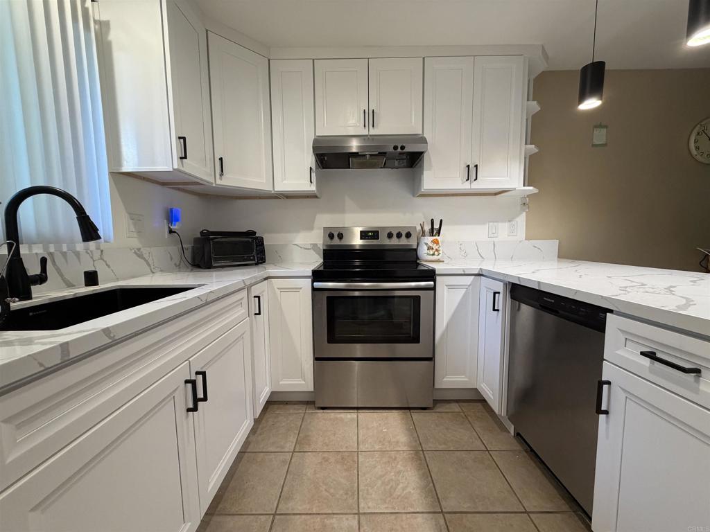 Welcome to this beautiful corner condo, ideally located near Downtown Chula Vista and offering easy access to freeways, golf courses, shopping malls, restaurants, and the state-of-the-art Gaylord Pacific Resort & Convention Center. Enjoy the ambiance of your beautifully UPGRADED gourmet kitchen featuring a stainless steel appliance suite package. This spacious unit boasts three private entries—front, back, and side—ensuring convenience and privacy for 2 spacious patios. Enjoy your own private front and back yard, perfect for relaxation and outdoor activities. Inside, you'll find ample storage space throughout, including closet organizers in the master bedroom. The master suite also features a full bath and a sliding door leading to the backyard. The unit is fully equipped with washer and dryer hookups and has been upgraded with newly installed heating units in each bedroom and a modernized electrical panel for peace of mind. Designed with accessibility in mind, this condo is ADA accessible. The community offers fantastic amenities, including a recreational room, pool, and jacuzzi, making it a perfect place to unwind. Don’t miss out on this must-see property—schedule a tour today!