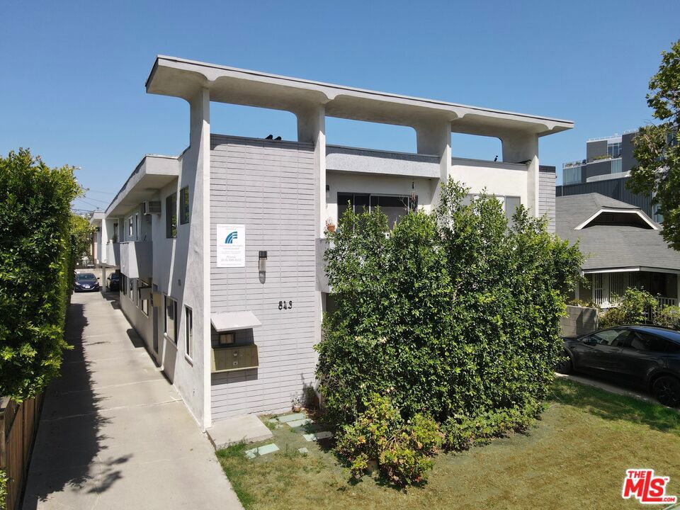 843 N Orange Drive, a 7-unit multifamily investment opportunity located in between West Hollywood and Hollywood, LA Proper. Situated just south of Santa Monica Blvd and east of N La Brea Ave. The property is comprised of 6- 2 bedroom 2 bath units and 1- 3 bedroom 2bath unit, averaging approximately 971 gross square feet each. Majority of all units include stainless-steel appliances, high-quality cabinets, laminated floors and quartz counter tops inside updated windows throughout. This rare offering presents an astute investor with the unique opportunity to acquire a building in one of the most sought after locations in the nation.