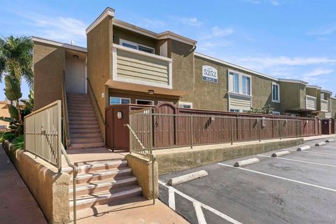 Photo of 5252 Balboa Arms Dr #120, San Diego, CA 92117 (MLS # 260004402SD)