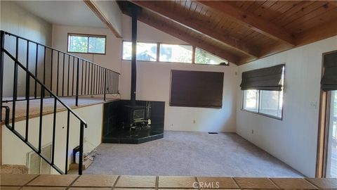 Photo of 31150 Summit Drive, Running Springs, CA 92382 (MLS # IG25173984) Photo of 31150 Summit Drive, Running Springs, CA 92382 (MLS # IG25173984)