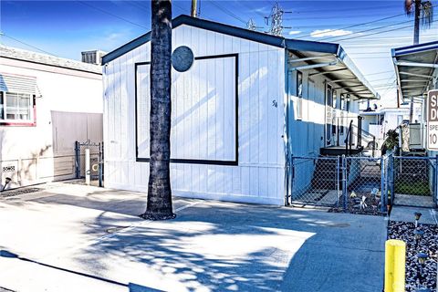 Photo of 8811 Park Street #54, Bellflower, CA 90706 (MLS # PW26007145)