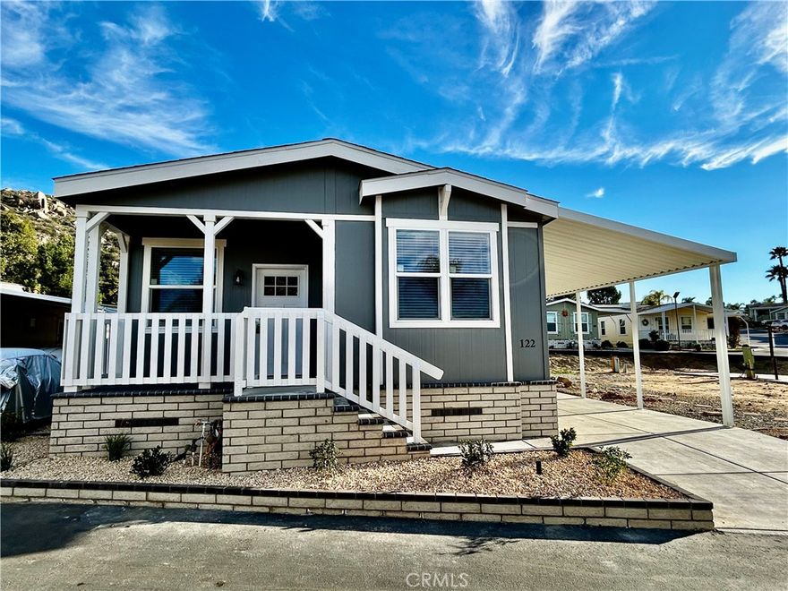 Beautiful brand-new 3-bedroom, 2-bath mobile home located in Hemet’s award-winning #1 all-ages family park (2024). This home features an open floor plan with a spacious kitchen, large center island, and walk-in pantry—perfect for entertaining and everyday living. The kitchen opens seamlessly to the living room, creating a bright and inviting space. Ceiling fans are installed throughout the home for added comfort. Exterior features include a storage shed, a large carport accommodating 2–3 vehicles, and a charming front porch ideal for enjoying stunning views. Enjoy the community pool and park for the kids with clubhouse and activities, Don’t miss this opportunity—schedule your private showing today!