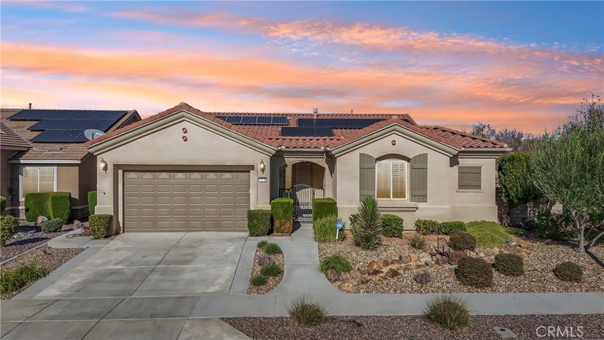 Welcome to this stunning 2-bedroom, 2-bath plus den home, beautifully situated on a professionally landscaped corner lot in the highly desirable 55+ Del Webb community of Solera Diamond Valley. With the addition of a private casita featuring a Murphy bed, closet, and full bathroom, this exceptional property truly offers **three bedrooms and three bathrooms**, providing incredible flexibility for guests or multi-generational living.

Spanning 2,130 square feet of thoughtfully upgraded living space, this home blends elegance, comfort, and functionality. The curb appeal is unmatched, showcasing professionally designed landscaping with decorative concrete, striking rock accents, and zero turf for low-maintenance beauty. A charming front patio invites you inside to a bright, open-concept layout filled with natural light.

Inside, enjoy 20-inch porcelain tile throughout the main living areas, crown molding, and a cozy fireplace that adds warmth and character. The chef’s kitchen is a standout, featuring stainless steel appliances, granite counter tops, upgraded fixtures, a large island with bar-top seating, a breakfast nook, and abundant cabinetry—perfect for both everyday living and entertaining.

The spacious primary suite is a private retreat, offering a generous walk-in closet and a spa-like bathroom complete with dual vanities, a step-in shower, and a walk-in jetted tub. A well-appointed secondary bedroom, guest bath, and versatile den provide ample space for hobbies, a home office, or visiting guests.

Additional highlights include a laundry room with built-in cabinetry and a utility sink, as well as a garage equipped with epoxy flooring, ceiling storage racks, and built-in shelving for maximum organization. Step outside to enjoy year-round relaxation under the California-style covered patio, featuring a fully enclosed and secure screened area. The side yard showcases exquisite, thoughtfully designed details that truly elevate the outdoor living experience.

Centrally located within the community, this home is just a short walk to the clubhouse, where you’ll enjoy access to resort-style amenities, fitness centers, pools, and a full calendar of social activities. Experience the perfect blend of refined living and vibrant 55+ lifestyle—this Solera Diamond Valley gem truly has it all!