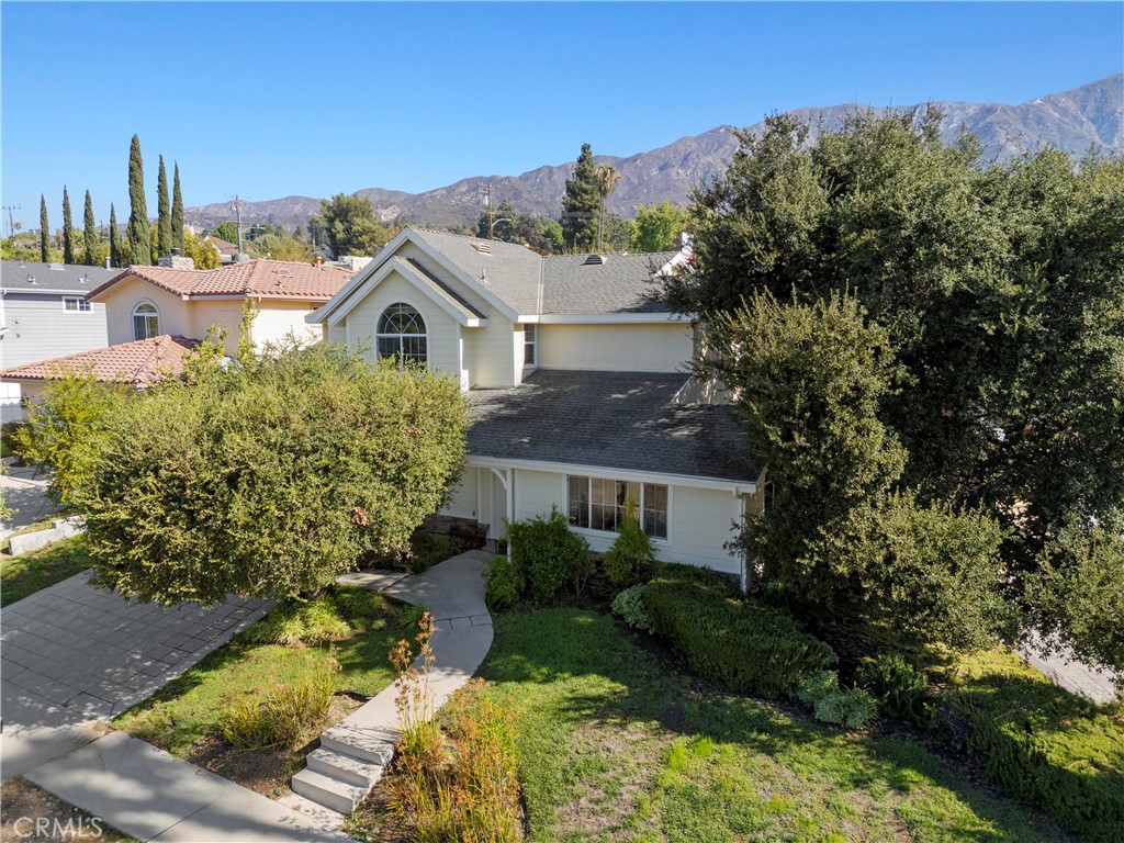 Nestled on a peaceful cul-de-sac in the highly sought-after foothills of La Crescenta, this inviting 4-bedroom, 2.5-bathroom home offers comfort, space, and functionality.
All four bedrooms are thoughtfully situated upstairs, including a spacious primary suite featuring a private full bathroom and a walk-in closet for ample storage. Three additional bedrooms share a second full bathroom, while a convenient powder room is located downstairs.
The main level boasts two generous living areas—perfect for both entertaining and quiet evenings by the fireplace. The kitchen is complemented by a walk-in pantry, while updated flooring flows seamlessly throughout.
Sliding glass doors open to a low-maintenance backyard, ideal for relaxing or enjoying California’s year-round sunshine. From upstairs windows, take in mountain views that add to the home’s serene setting.
Located within award-winning Blue Ribbon schools, this property combines community, convenience, and charm. With its prime location and desirable features, 3541 Mary Ann Street is the perfect place to call home.