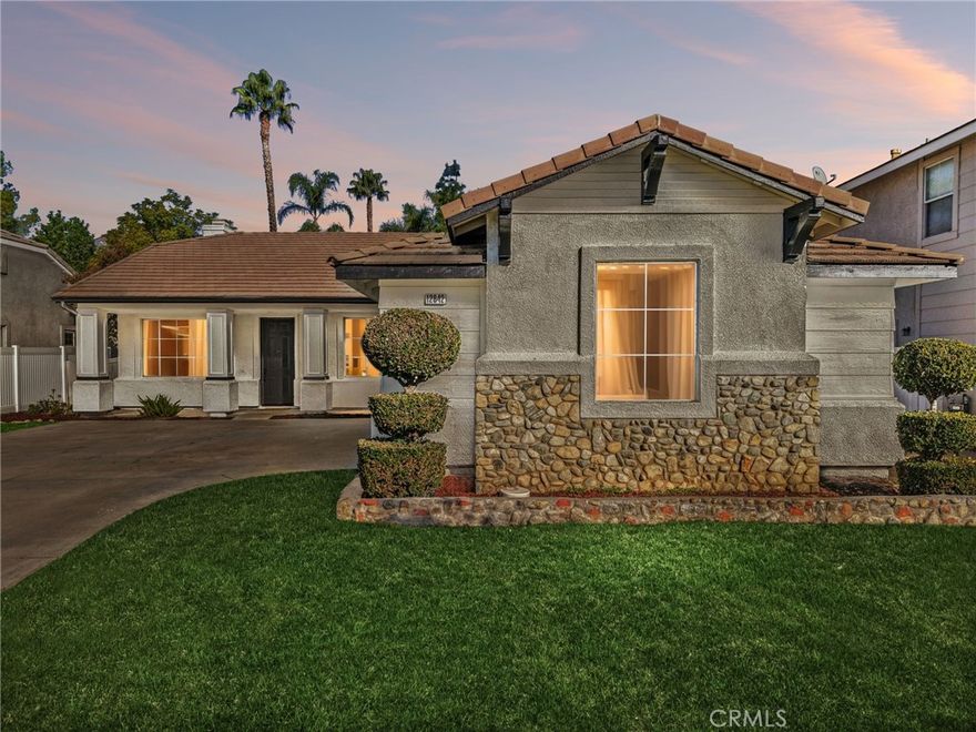 This beautifully remodeled single-story residence delivers refined living with 4 bedrooms, 2 baths, and 1,951 sq. ft. of elevated design in a premier neighborhood located in Rancho Cucamonga. The home welcomes you with an elegant open-concept layout featuring sophisticated finishes, formal living and dining spaces, and an upgraded family room enhanced by a designer fireplace. The chef-inspired kitchen showcases modern cabinetry, premium surfaces, offering the perfect balance of cooking and entertaining, enhanced by effortless indoor-outdoor flow to the backyard.

The luxurious primary suite with it's own private access to the backyard, has been redone including a walk-in shower, tub, and dual vanities. The expansive backyard offers a blank canvas to create an outdoor oasis worthy of the home’s high-end interior. With top-tier upgrades, a fantastic location near shopping, excellent schools, and exceptional craftsmanship throughout, this remodeled home defines turnkey perfection.