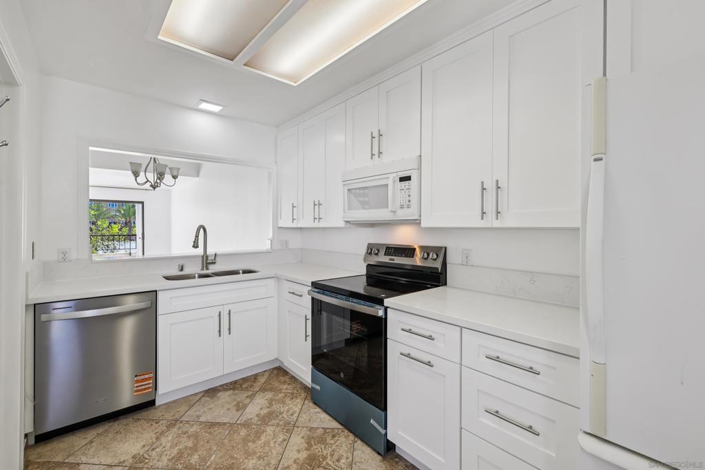 Newly remodeled upper unit, with rarely available THIRD bedroom! This unit has been completely updated with new kitchen, new bathrooms, new flooring, new paint, and much more! Fantastic condo in a highly desirable complex at the corner of Nobel and Lebon! This secure community offers unbeatable convenience with shops, dining, UCSD, and freeway access just moments away. The spacious floor plan features 3 bedrooms and 2 bathrooms. The 3rd bedroom is upstairs for added privacy and personal space. Dual-primary layout, adding flexibility to suit your lifestyle. Gather in the living room around the cozy fireplace or on the serene balcony and enjoy the idyllic San Diego weather all year long. The updated kitchen shines with crisp, white cabinetry, countertops, and appliances. In-unit laundry includes a full-size stacked washer and dryer for maximum convenience. Additional highlights include two secured underground parking spaces (tandem, but has access for both cars with no need to remove one before te other can exit) and a private storage area off the garage. La Jolla Garden Villa is a well-manicured, gated community that offers its residents outdoor cooking and a sparkling pool. A wonderful opportunity in a prime location!