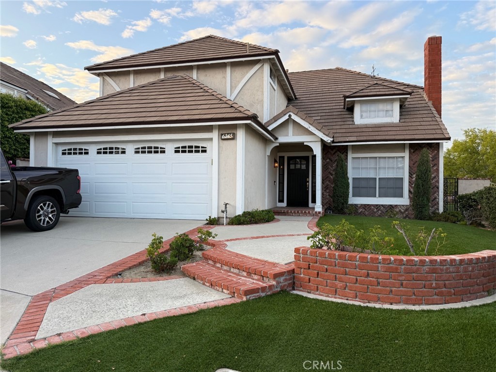 Luxury Living at a Great Rental Price! Welcome to Rocking Horse Ridge, the Guard-Gated Prestigious Community located in the Hills of Orange. This highly-upgraded four bedroom home offers all of the following features AND MORE! On the Inside you'll enter to Luxury Vinyl Planked Floors that look like wood, recently painted throughout, two fireplaces for these upcoming cozy nights, living room, dining room, and family room. Upgraded kitchen with granite counters, built-in oven and microwave, Jenn-air electric cook top, dishwasher, and a view out the window that will make washing dishes an actual joy. Entertain with a separate wine bar area with mini-fridge. Laundry area inside with a washer & dryer included. Upstairs there is a primary master bedroom to die for! Oversized with a view of the evening sky! The primary bath has been highly upgraded to include a soaking tub, walk-in shower, separate toilet area, double sinks and massive amounts of closets. Three other bedrooms conveniently share a guest bathroom. The attached two-car garage includes a salt water softener and EV plug in. Outside you will find a putting green to practice your golf game and a soaking pool just the right size to cool off. The community offers pickle-ball courts, pool, tennis, and a clubhouse. You will find this home checks all of your boxes! Make this home the one you've always dreamed of!