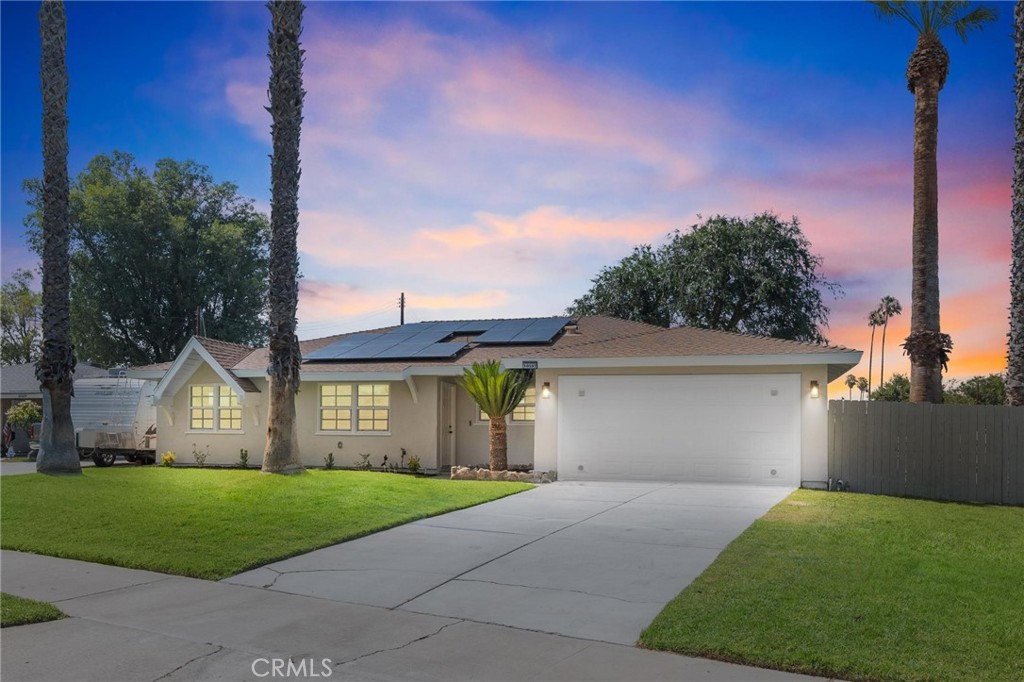 Fall in love with this stunning, move-in ready 4-bed, 2-bath La Sierra home that has been completely remodeled from top to bottom — plus owned solar for ultra-low energy bills!
The moment you step inside, you’ll feel the warmth of the open floor plan, the fresh designer paint, and the glow of recessed LED lighting. Brand-new luxury vinyl plank floors flow throughout, leading you to a gorgeous upgraded kitchen with granite counters, stainless steel appliances, and a breakfast bar perfect for morning coffee or late-night chats.
Your primary suite is a private retreat with a spa-like bath featuring marble shower floors and a sleek frameless glass enclosure. Every detail has been upgraded — from new interior doors and trim to modern light fixtures, PEX re-piping, newer dual-pane windows, energy-efficient sliding door, and a new electrical panel. The epoxy-coated garage is the perfect touch for car lovers or hobbyists.
Outside, the spacious corner lot offers a lush front lawn and a backyard that’s a blank canvas — dream garden, play area, or entertainer’s paradise, it’s ready for your vision.
All of this with an extremely low 1.15% tax rate, NO HOA, and a location that’s second to none — minutes from Tyler Mall, La Sierra University, Kaiser Permanente, Castle Park, shopping, dining, and the 91/15 freeways.
This is more than a home — it’s a lifestyle. Schedule your tour today before this La Sierra beauty is gone!