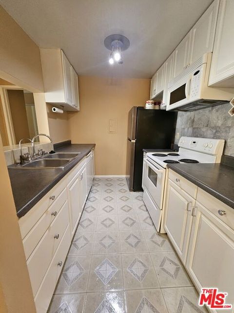 Photo of 5460 White Oak Avenue #C223, Encino, CA 91316 (MLS # 26647725)