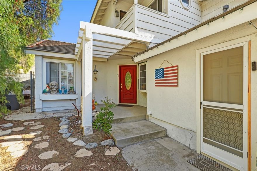 Set in a prime location at the end of a quiet cul-de-sac, is this paired single-family home (shares one common wall w/ neighbor).  The private 1/2 acre lot is one of the largest lots in the tract and provides peaceful views of the surrounding nature and Chino Hills State Park.  The versatile floorplan includes TWO main floor bedrooms.  The kitchen has quartz counters and is open to both the Living and Dining rooms.  The Primary Suite spans the entire second floor and features a viewing balcony, 2 closets and a large bath pavilion with dual vanities.  The permitted sun room leads to the pool-sized low maintenance grounds with flagstone hardscape.  Other amenities include a 2 car garage with direct access into the home, and NO HOA.  This home has the best of both worlds - a true feeling of nature and serenity, yet just minutes to shopping, restaurants and top-rated schools including sought-after Yorba Linda High School.  This is a great opportunity to acquire a home in one of Yorba Linda's best locations!