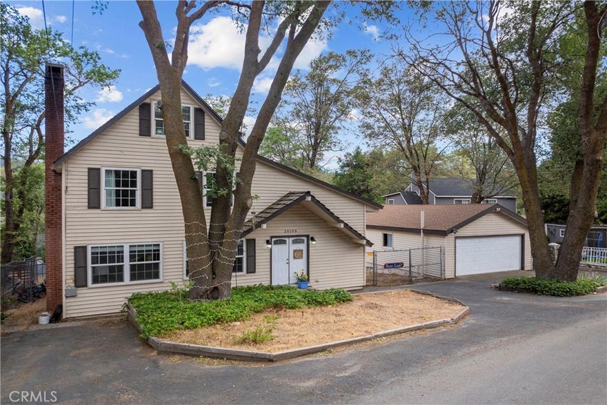 LEVEL FRONT & LEVEL BACK YARD.  Big, sprawling “modern farmhouse” in adorable community of Cedar Glen has it all. On the coveted street of Lake View close to the famous “Malt Shop,” and The Glen shopping center arrive to a formidable property, on all level ground, that soars three levels under the canopy of a large oak.   Step into a foyer and beyond into a two-story living room with cathedral ceilings and corner, floor-to-ceiling, lava rock fireplace.  On the right, a bank of tall windows brings in natural light, and on the left, an open floor plan reveals the kitchen and dining nook separated by a large eat in bar, all nestled under whitewashed beams above.  Sliders open out from the living area & kitchen onto a large NEW deck and huge, perfectly flat backyard.   Adjacent is a large cozy den, and another fireplace framed on both sides with whitewashed book shelves the entire length of the room; and a powder room.  _____________________Upstairs, a music loft can be seen from below that is connected to a large primary bedroom, another bedroom and a full bath.  Travel a short flight of stairs where two smaller bedrooms are perfect for growing children. ____________________________ A short walk downstairs is an entire studio apartment that can be rented.  The main room has a living/kitchenette (sink/counter/cabinets), bedroom area and ¾ bath; with separate entrance.  Parking at the front of the house is for five cars and on large lot, adjacent to the home is a super-sized two car garage.  WHOLE HOUSE GENERATOR