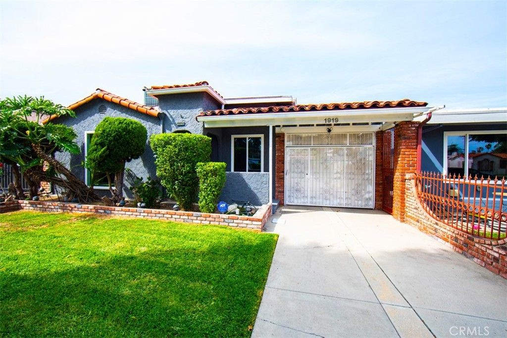 Photo of 1919 W 82nd Street, Los Angeles, CA 90047 (MLS # SB26066759)