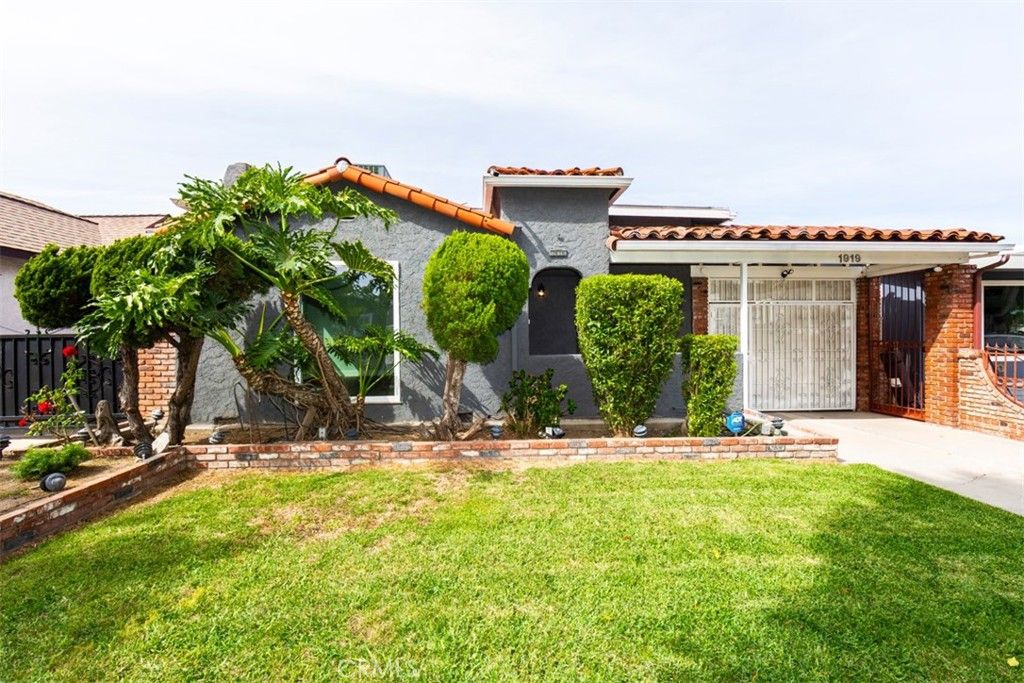 Photo of 1919 W 82nd Street, Los Angeles, CA 90047 (MLS # SB26066759)