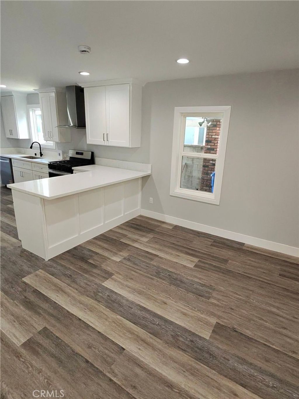 Photo of 1919 W 82nd Street, Los Angeles, CA 90047 (MLS # SB26066759)